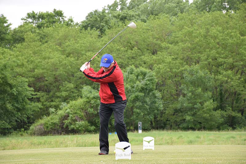 Steve Soper tees off at the Saturday afternoon golf outing