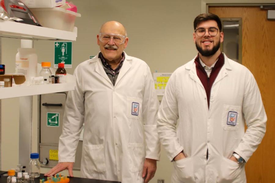 michael hageman and yezan salamoun stand in the lab