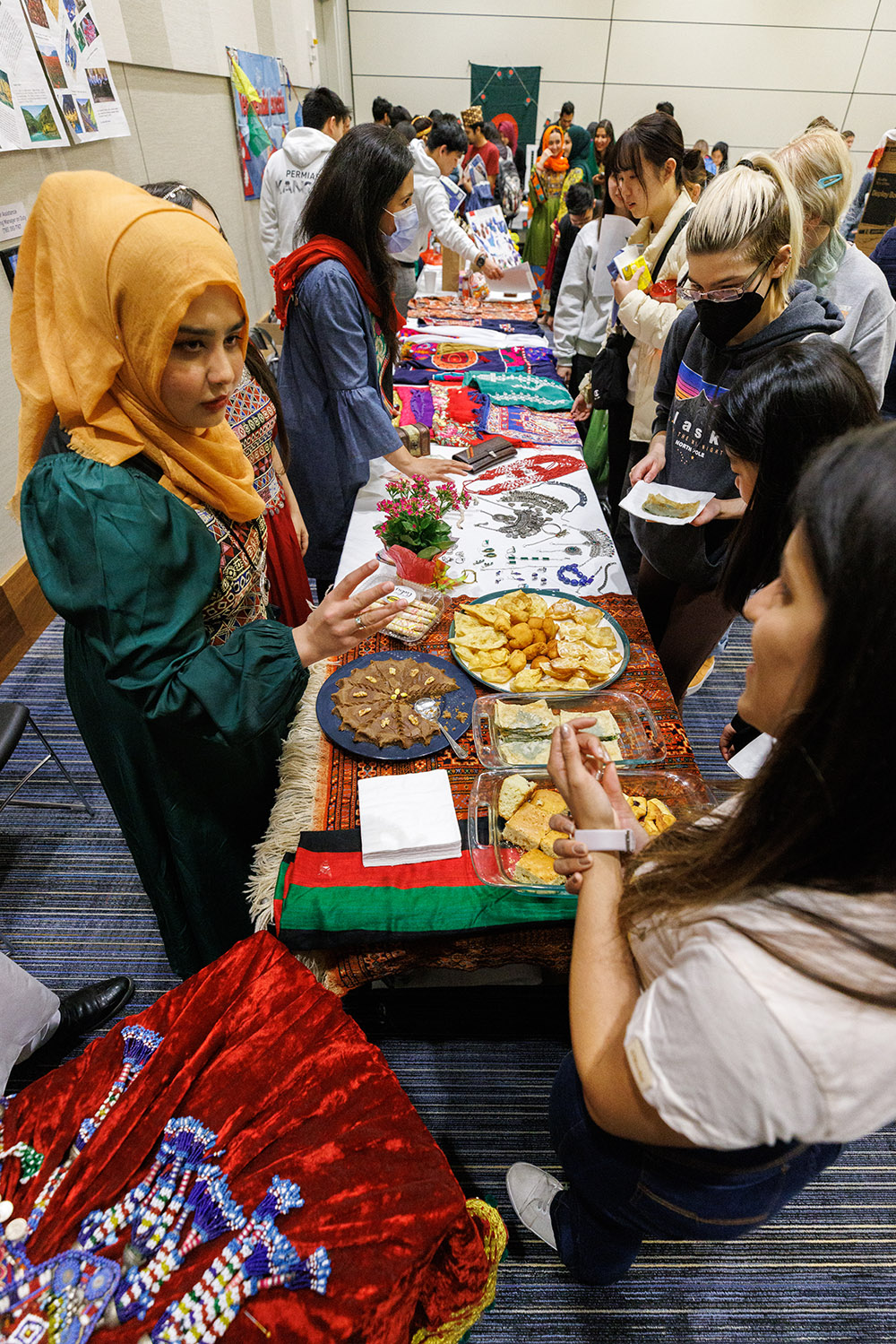 Participants serving food at International Jayhawk Festival 2022.