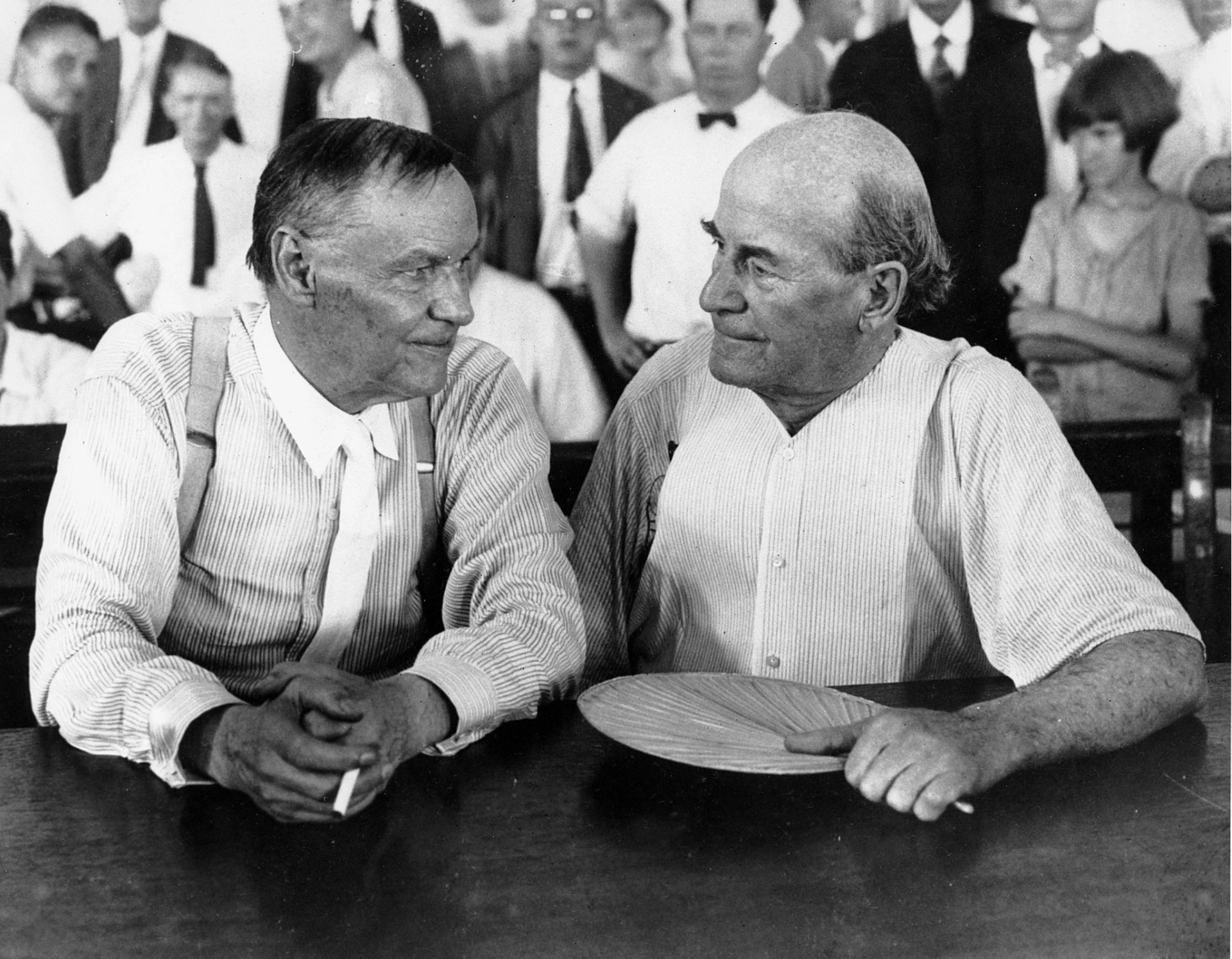 Clarence Darrow, left, and William Jennings Bryan have a conversation during a break from the trial. Courtesy of Wikimedia Commons.