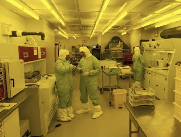 Image of lab workers at the Center of BioModular Multiscale Systems for Precision Medicine.