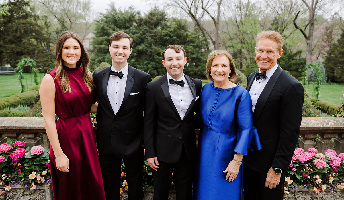 From left: KU alumni Maddie Dolan, bachelor’s in exercise science, 2021; John P. Black, bachelor’s in psychology with a minor in history, 2022; KU Medical Center alum Paul J. Black, medical degree, 2023; Julie Cheslik and Paul M. Black.