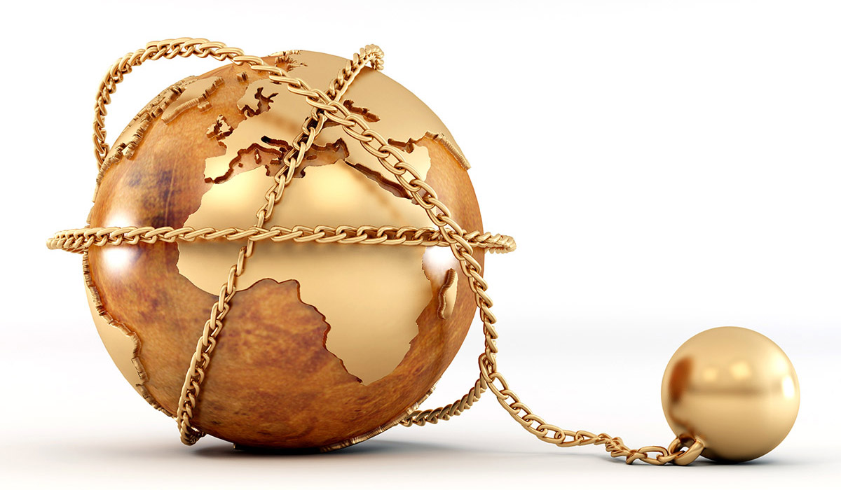A globe wrapped in a gold chain with a connected ball, illustrating a ball and chain weighing it down.