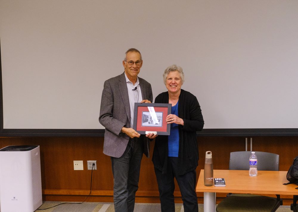 Prof. Sue Lunte presents plaque to Prof. David Walt