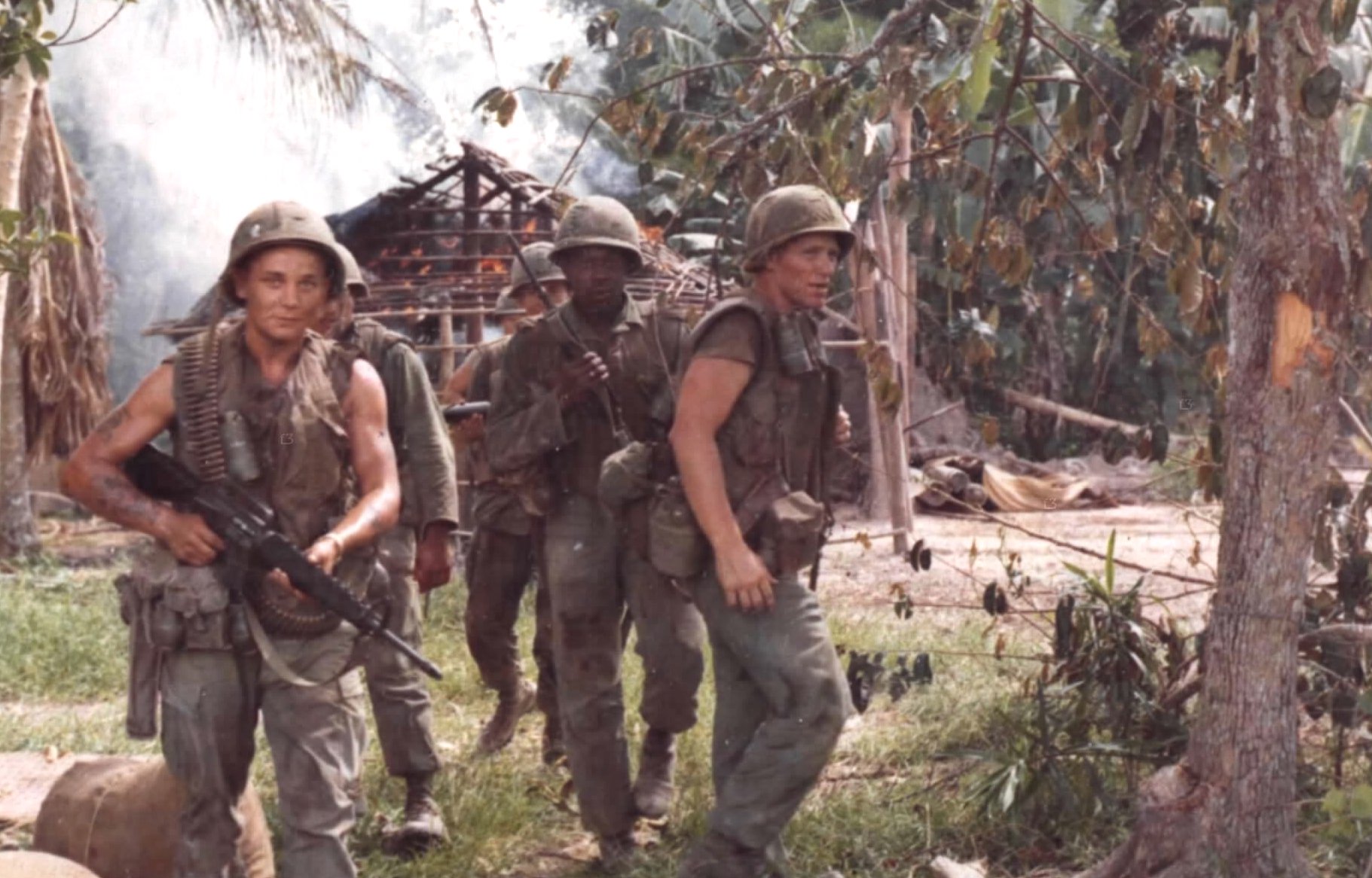 Members of the United States' 14th Infantry conduct a search and destroy mission during the Vietnam War