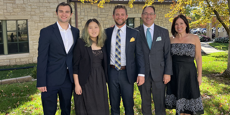 Matt and Amy Paquette (right) with their children Luke, Grace and Zach.