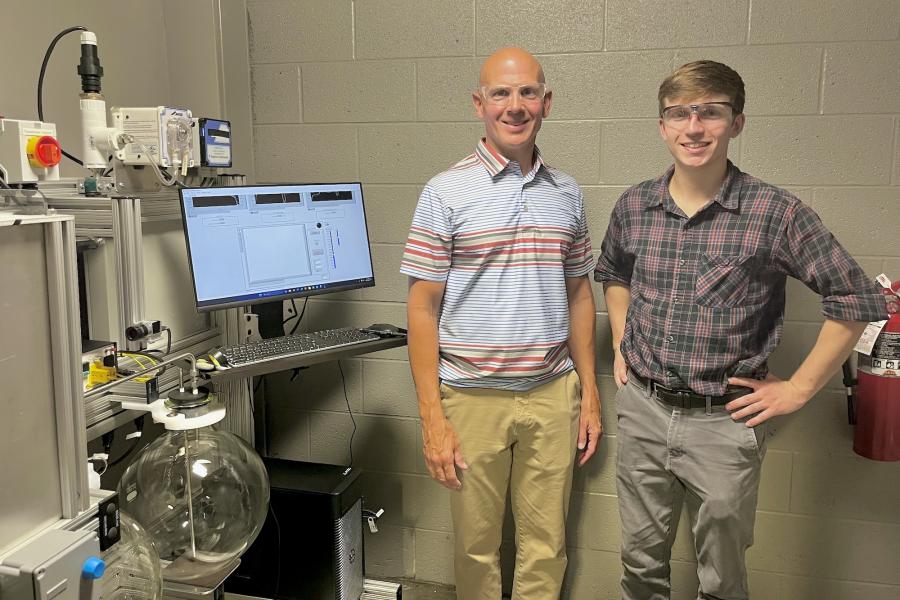 Mark Shiflett (left) and Kevin Turner led the research team that developed a more accurate testing apparatus that precisely measures the flammability of refrigerants in an effort to develop the next generation of refrigerants that are non-flammable, as well as environmentally safe.