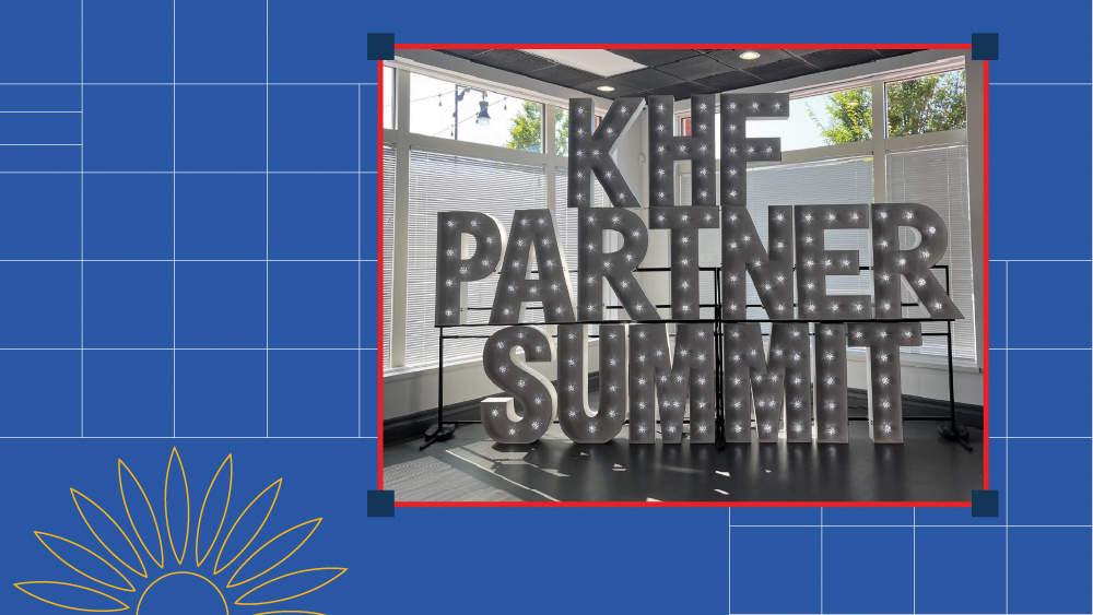 KHF Summit Partner Summit logo against a blue background with grid lines and sunflower