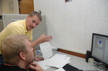 Shannon Blunt and a colleague at work