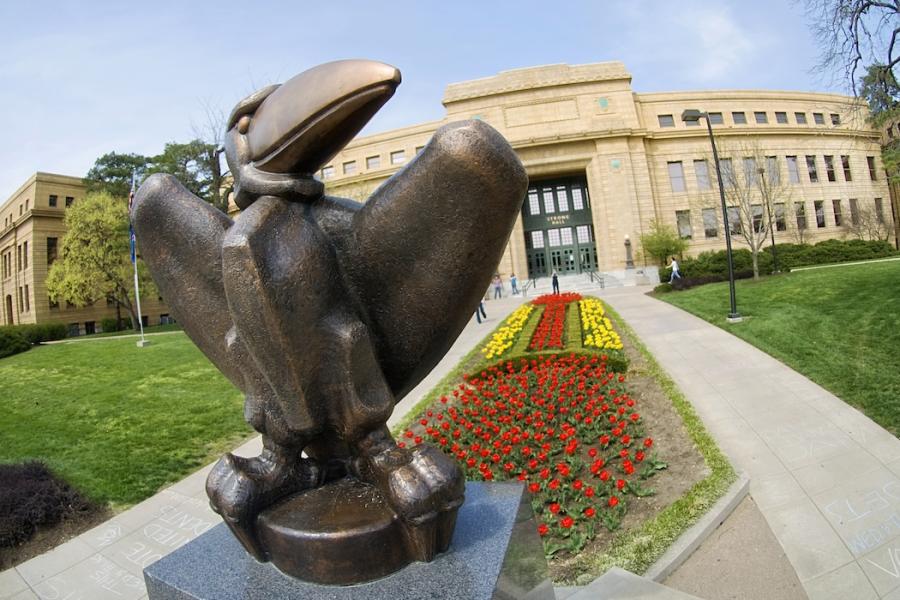 Academic Jay sculpture in front of Strong Hall
