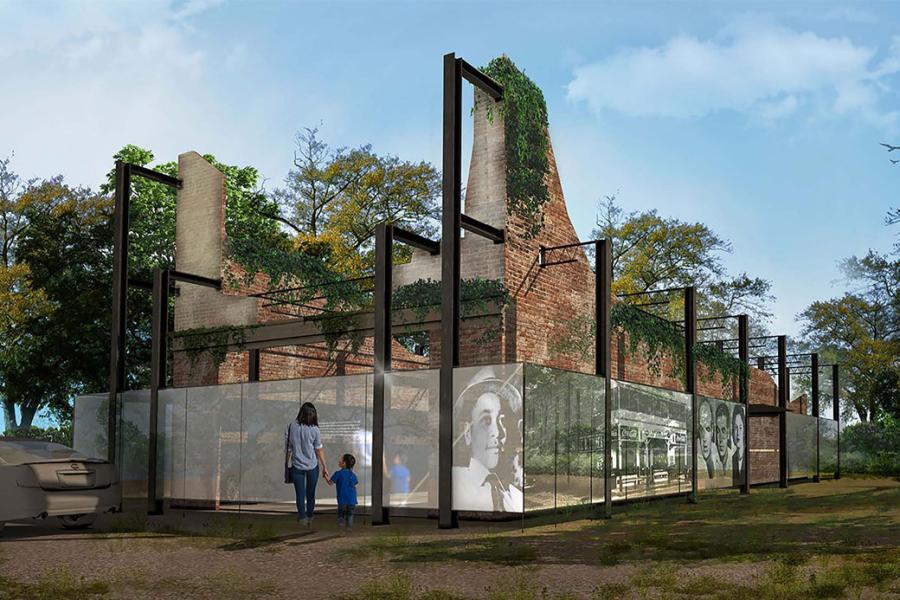 Artist's rendering of ruined building, surrounded by lighted panels with image of Emmett Till, as visitors pass.