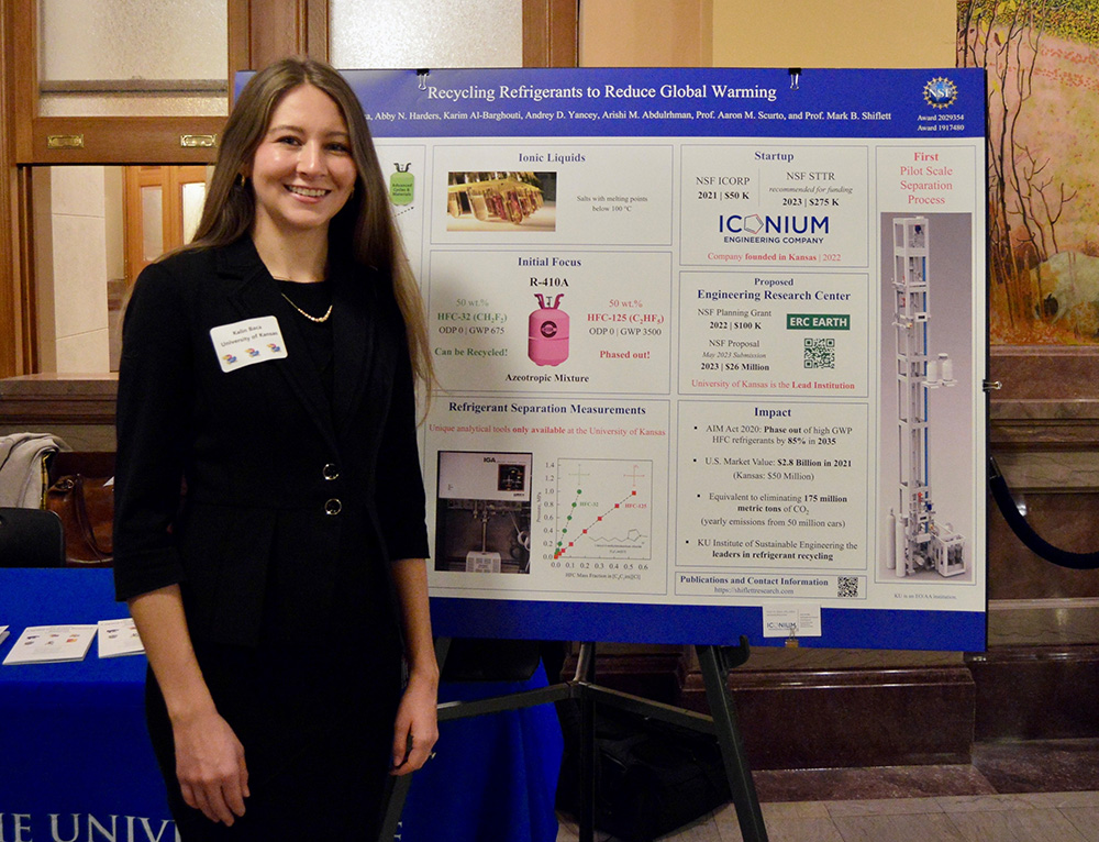 Kalin Baca, KU doctoral student, with her research poster.