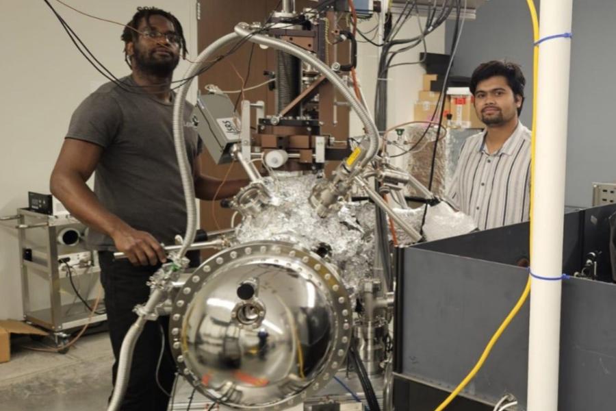 KU researchers Kushal Rijal (right) and Neno Fuller (left) performed the TR-TPPE measurement using a ultra-high vacuum photoemission spectroscopy system used in the resesarch.