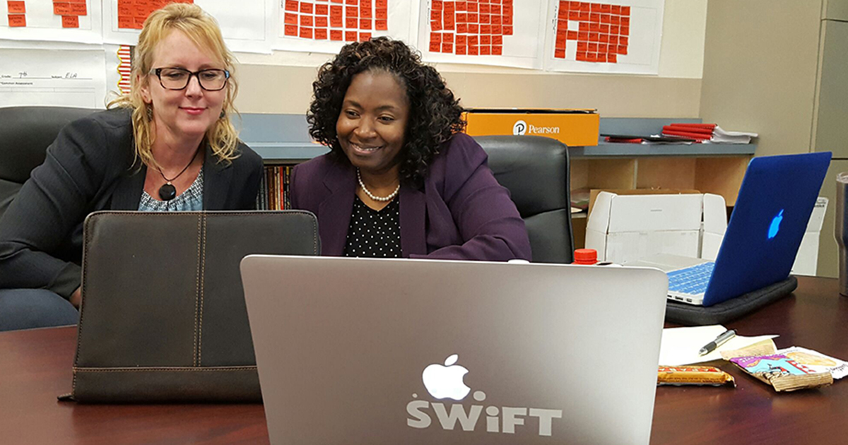 Amy McCart, left, director of the SWIFT Education Center at the KU Life Span Institute, has been working with administrators across the country such as Amy Carter, right, to improve educational outcomes for 15 years. 