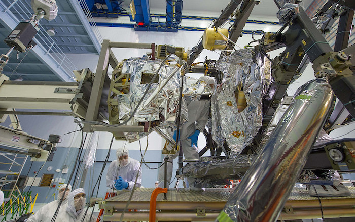 Installation of MIRI into the instrument module of the James Webb Space Telescope. Credit: NASA.