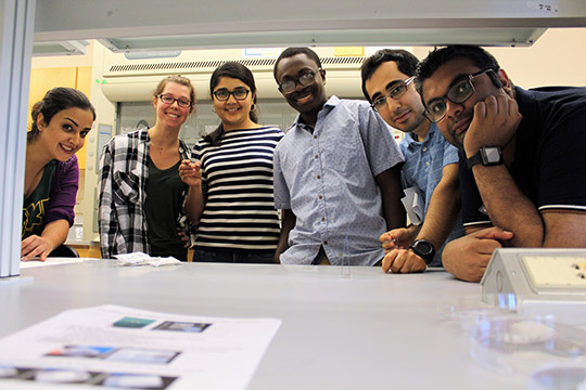 From left, Mahsa, Virginia, Kavya, Joel, Hooman, and Md Foysal with their completed chips.