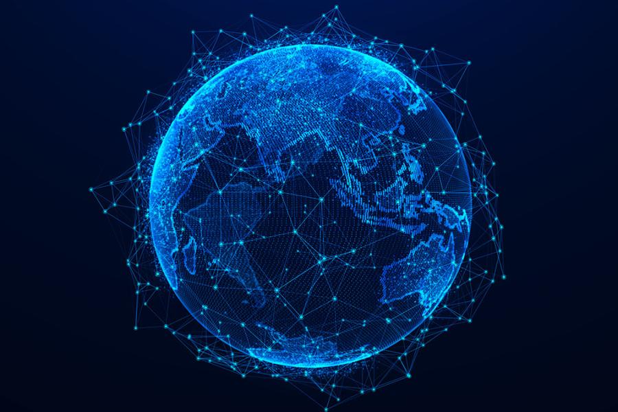 An illustration of a globe made digitally, with continents comprised of digital connections to display the connections between lands.