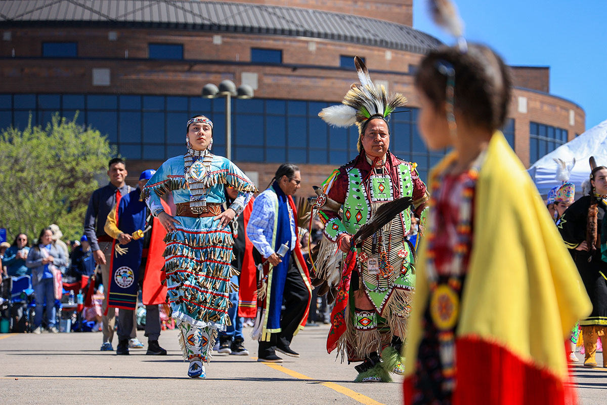 Participants at the the 2023 KU First Nations Student Association (FNSA) Powwow & Indigenous Cultures Festival at the Lied Center of Kansas. Credit: Laura Kingston. 