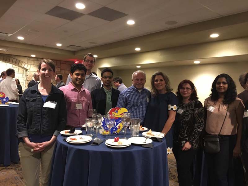 Members of the Soper group at the Chemistry Alumni Symposium Friday evening reception. From Left: Lindsey Roe, Kumuditha Ratnayake, Matt Jackson, Brandon Young, Steve Soper, Shauna Soper, Maggie Witek, Charuni Amarasekara