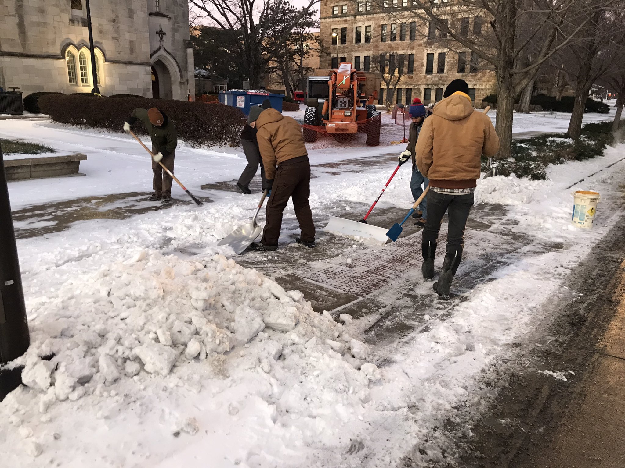 KU Grounds Crew clears up snow on Lawrence campus.